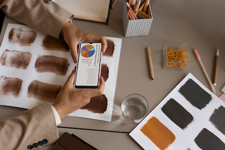 top-view-hands-holding-smartphone